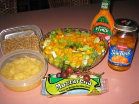 The Johnsons, Christy and Tom, like to try new recipes and create their own. Christy created this salad as a light meal for summer after her workouts at the gym. Her husband, Tom, likes to cook also, and his Shredded Chicken Sandwich recipe appears below. Goes great with this salad.